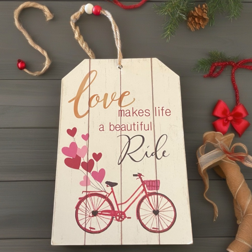 Hanging wooden bicycle theme sign.”Love makes a beautiful ride” 6”